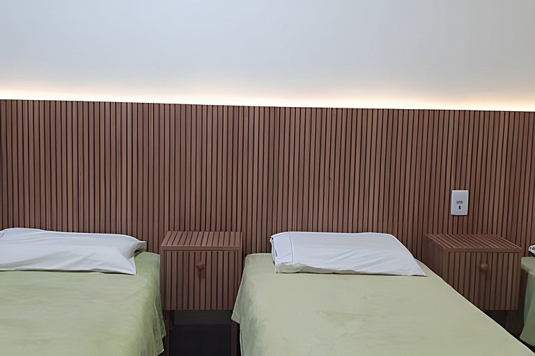 Casa Bertioga+20hosp 7suites ar cond 400m da praia