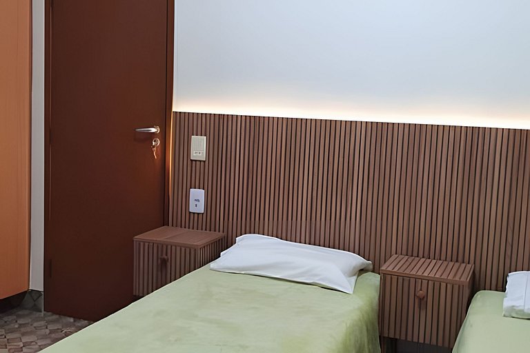 Casa Bertioga+20hosp 7suites ar cond 400m da praia